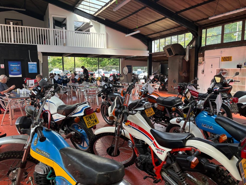 Image of many motorbikes at a cafe